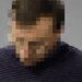 Громко слушал русскую музыку во дворе, а после замечания достал пистолет: бывшему судье сообщили о подозрении